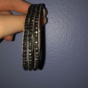 gray bracelet with black studs of real metal